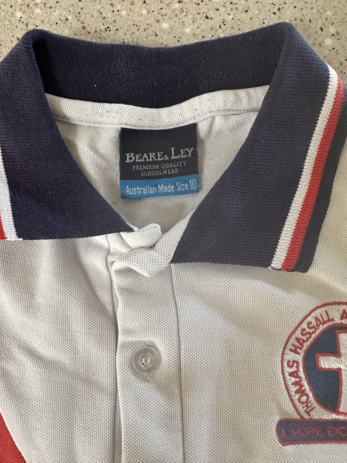 Short sleeve junior sports polo size 10. Kindy – Yr6